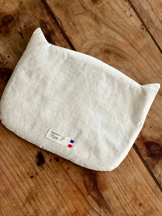 Bouillotte artisanale qui réchauffe et soulage douleurs, migraines et coliques